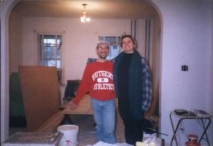 Kevin and Cecile Laurant-Attahlin woking on living room